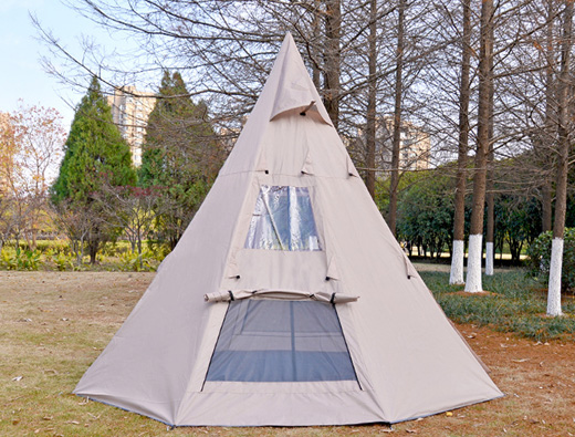 4-5 people camping outdoors in peaked tents